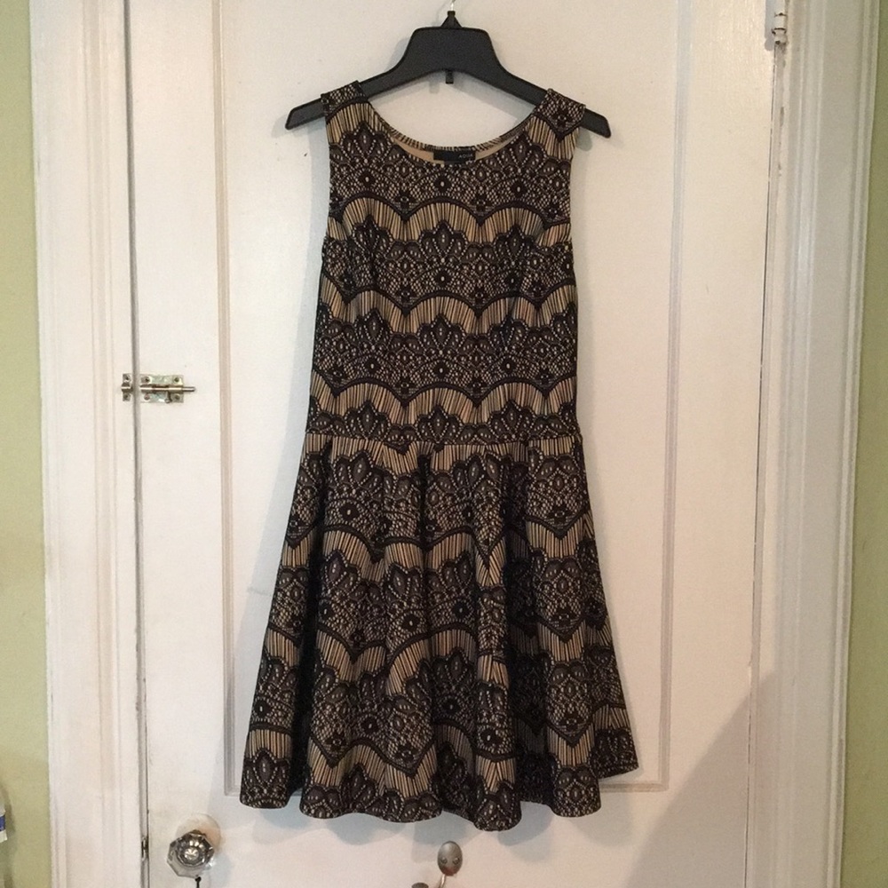 Black and nude open back dress